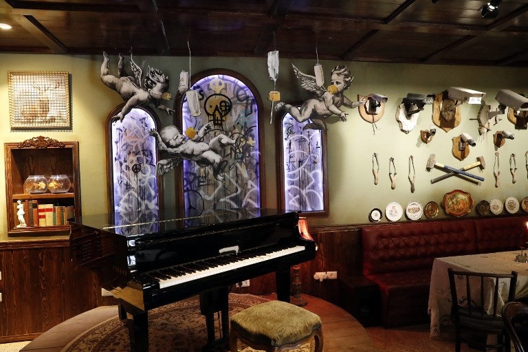 A picture shows the lobby inside street artist Banksy